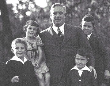 William Moulton Marston had four children, two by his wife and another two by his "live-in mistress". His wife adopted those children, and all lived together "harmoniously"