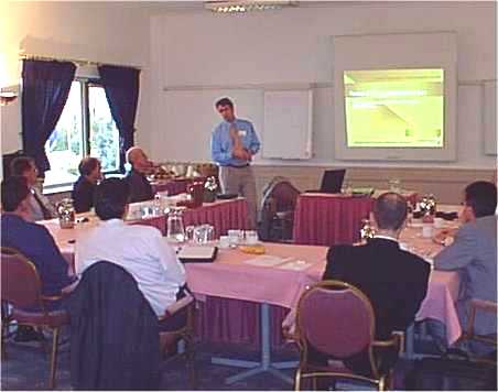 Brian leads a management briefing session